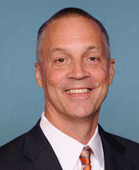Curtis J. Clawson